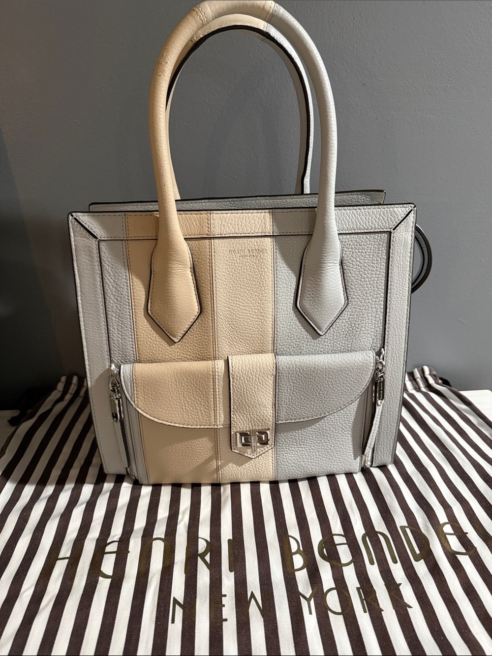 Henri Bendel Rivington tote is crafted from textured cream leather